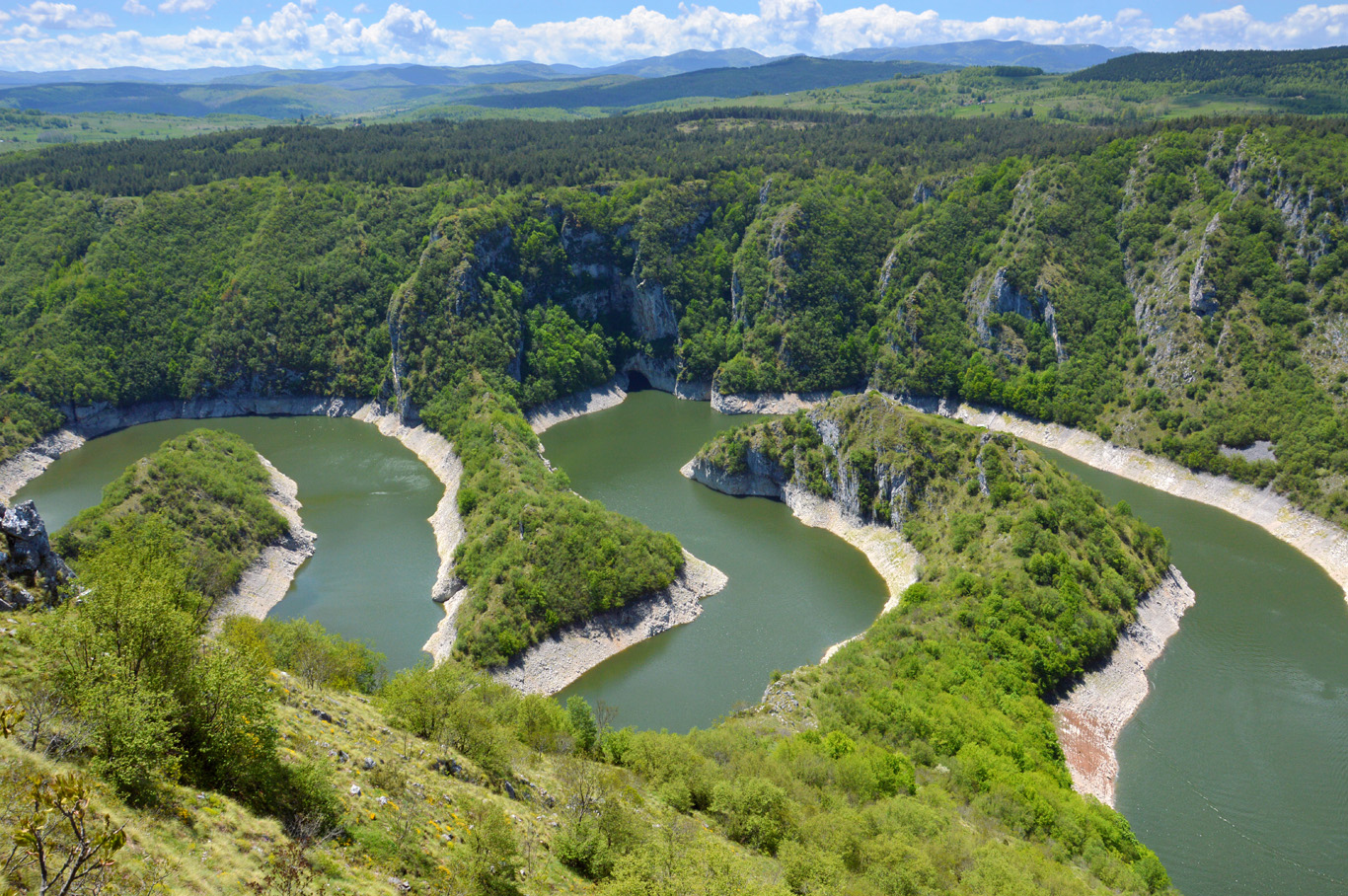 Uvac River winding through forested limestone cliffs in Western Serbia
