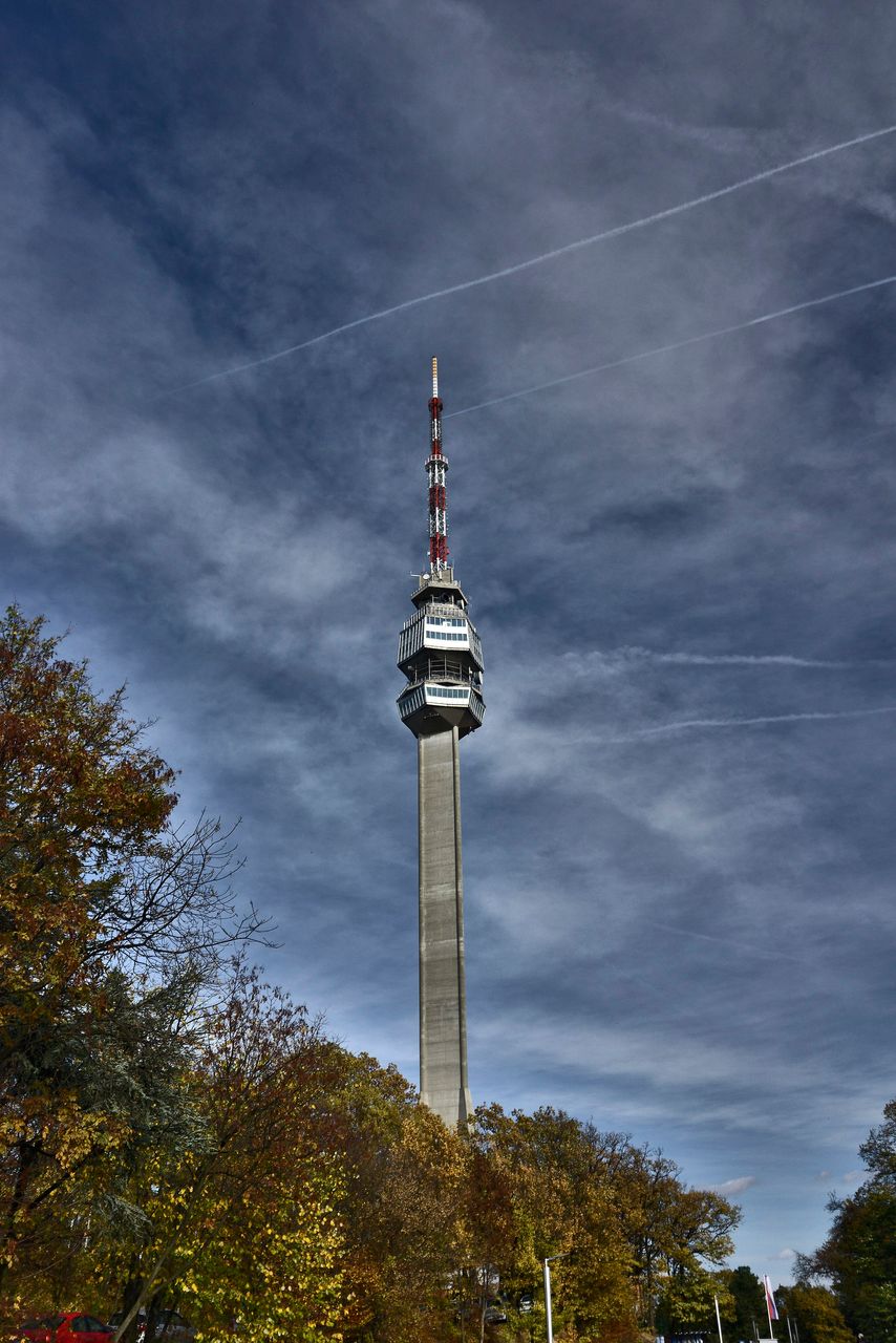 Visitors looking out from the Avala Tower observation deck over Belgrade and the surrounding hills