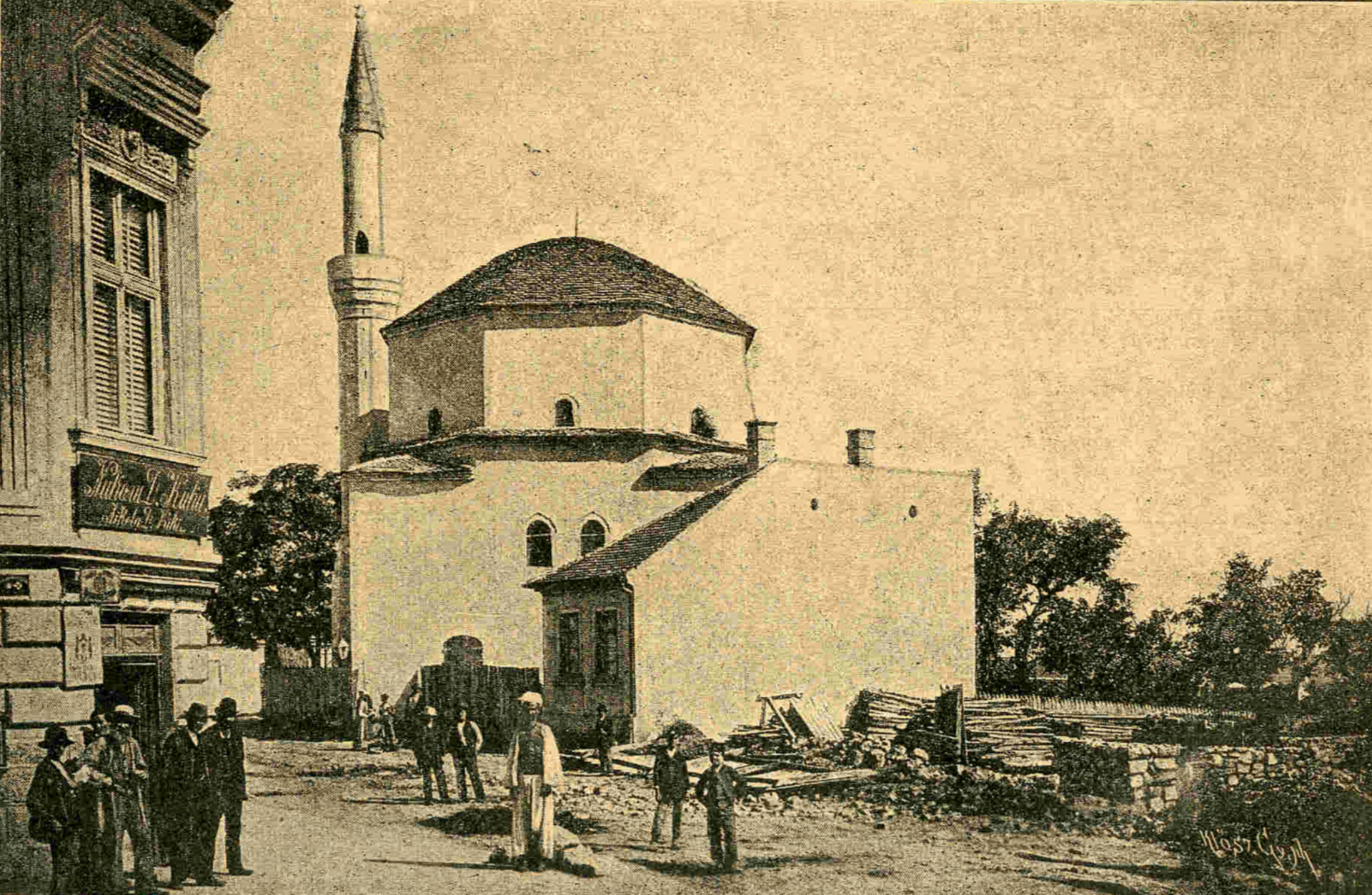 Bajrakli Mosque in Belgrade with a minaret, small dome, and people standing in front
