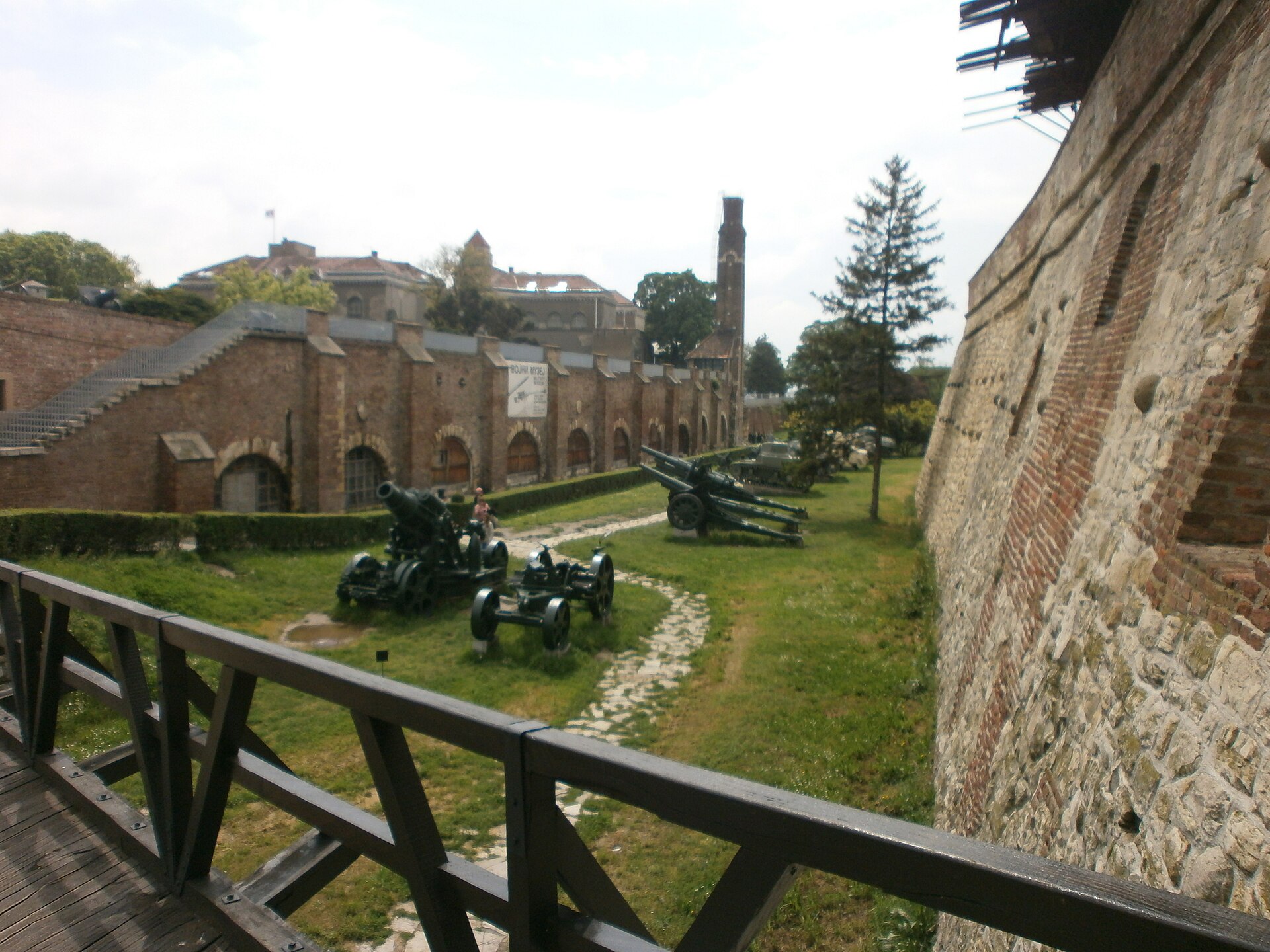 Visitors walking through Kalemegdan park toward the fortress