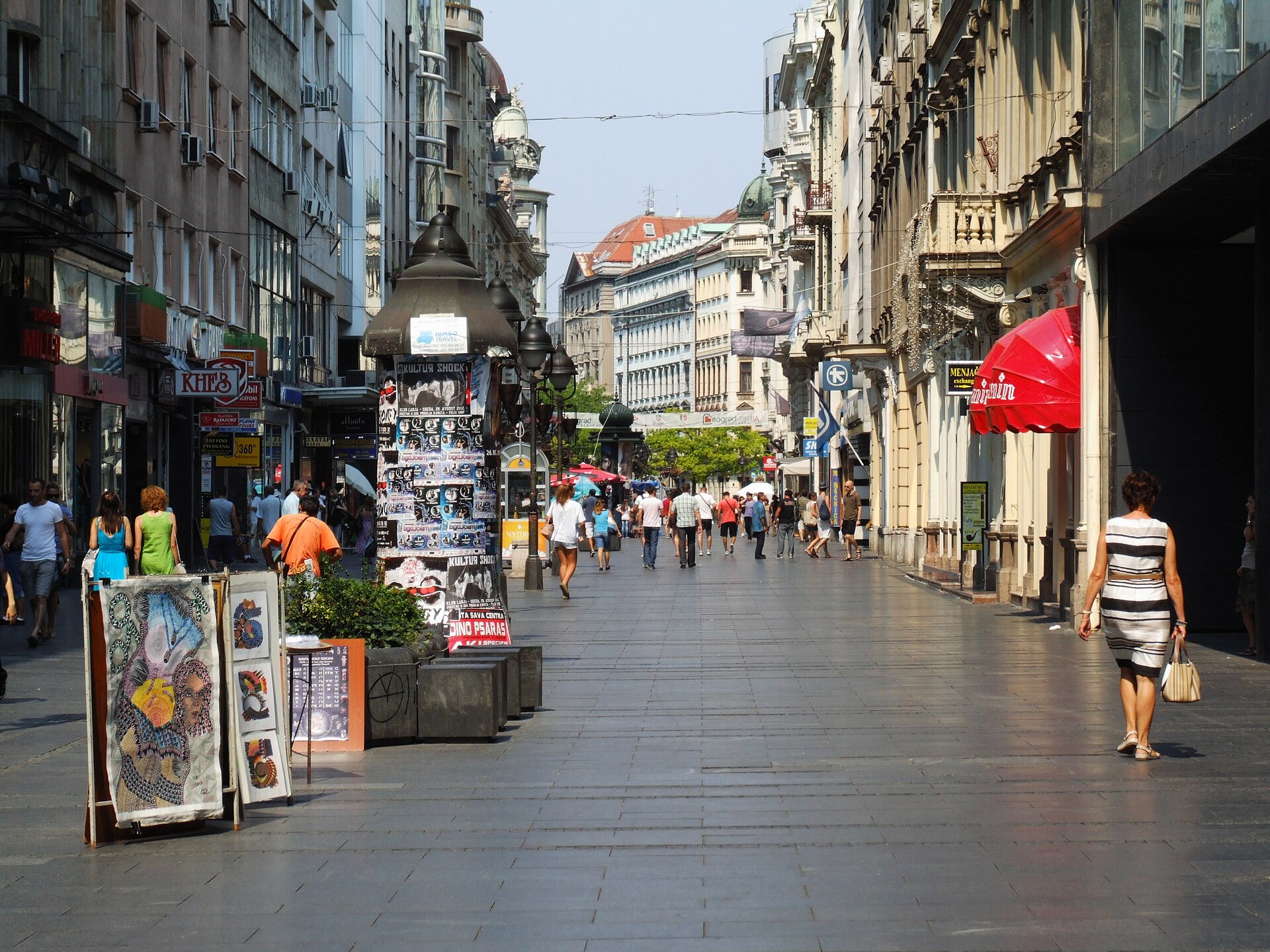Storefront on Knez Mihailova Street with pedestrians passing by
