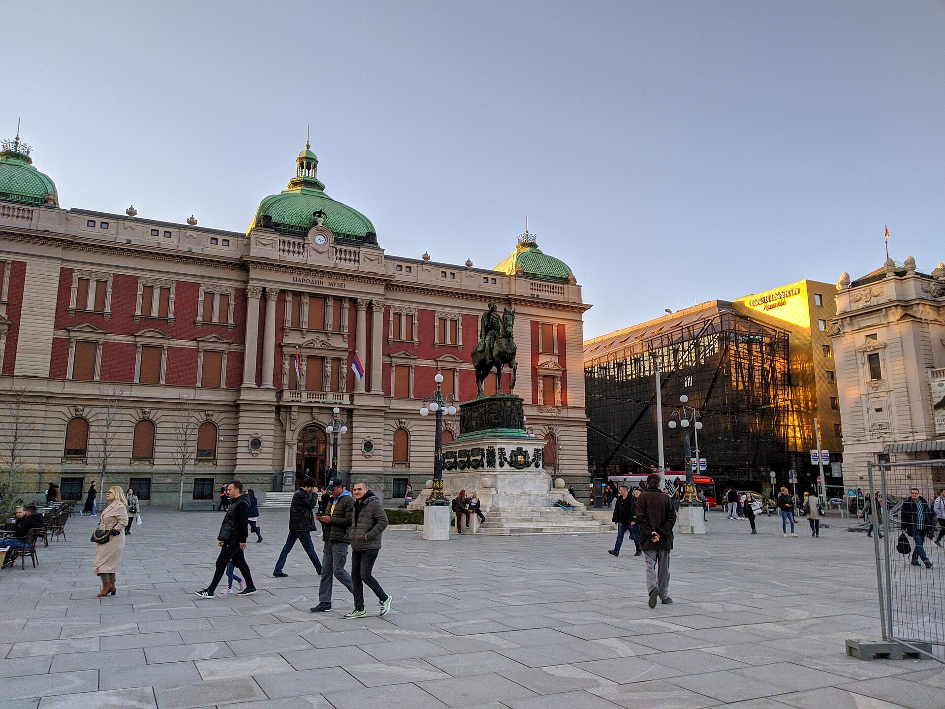 Plaza in front of the National Museum in Belgrade with an equestrian statue and pedestrians