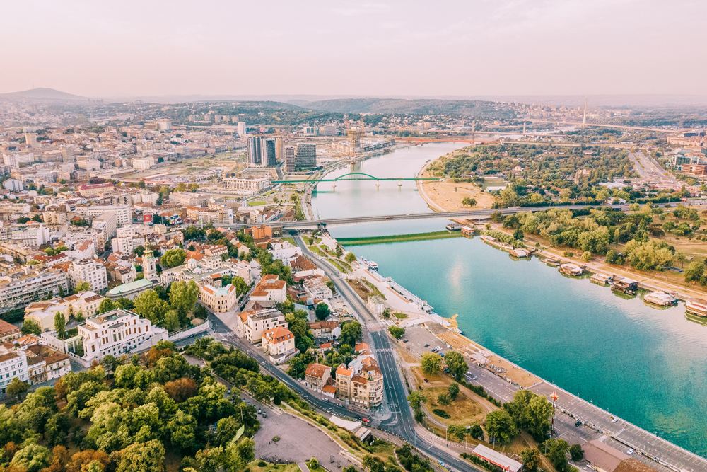 Aerial view of Belgrade with the Sava River, bridges, and city neighborhoods in Serbia