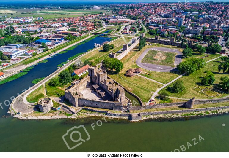 Aerial view of Smederevo Fortress beside the Danube with walls, towers, and green parkland