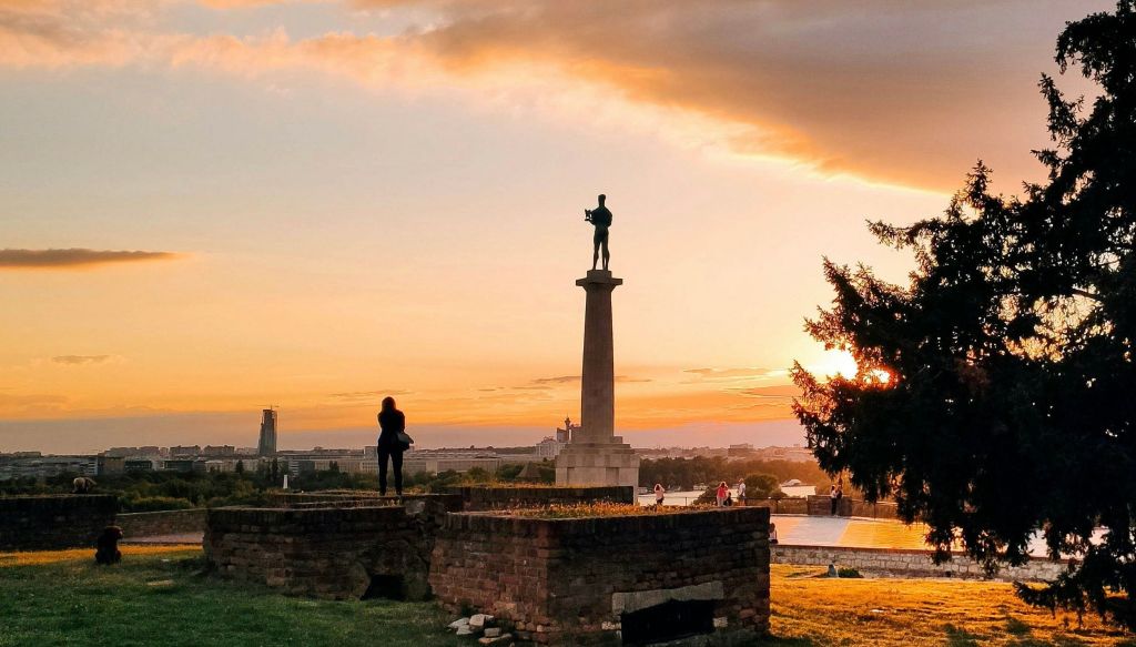 The Victor Monument at Kalemegdan with park paths and fortress walls in Belgrade