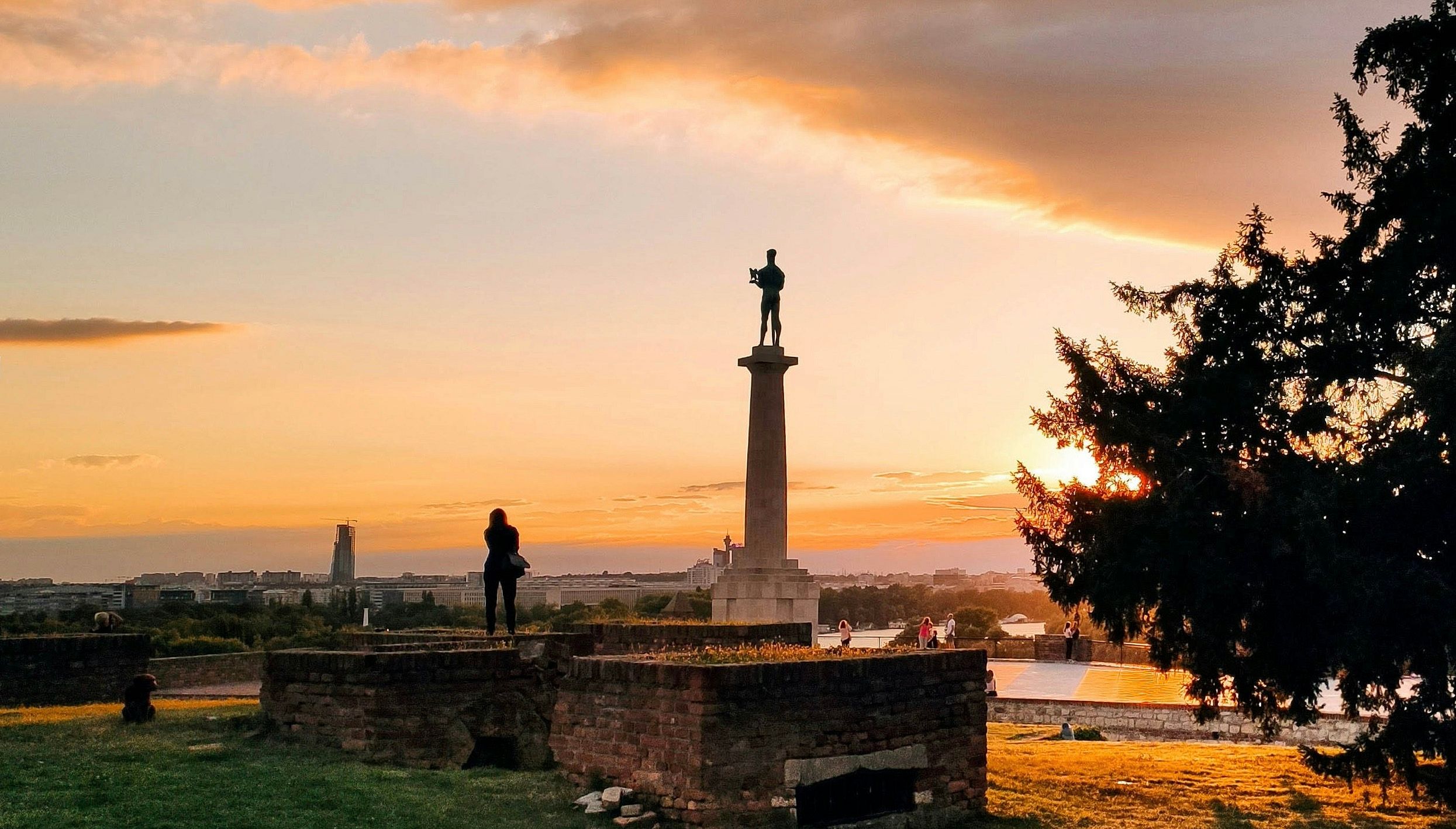 The Victor Monument at Kalemegdan with park paths and fortress walls in Belgrade