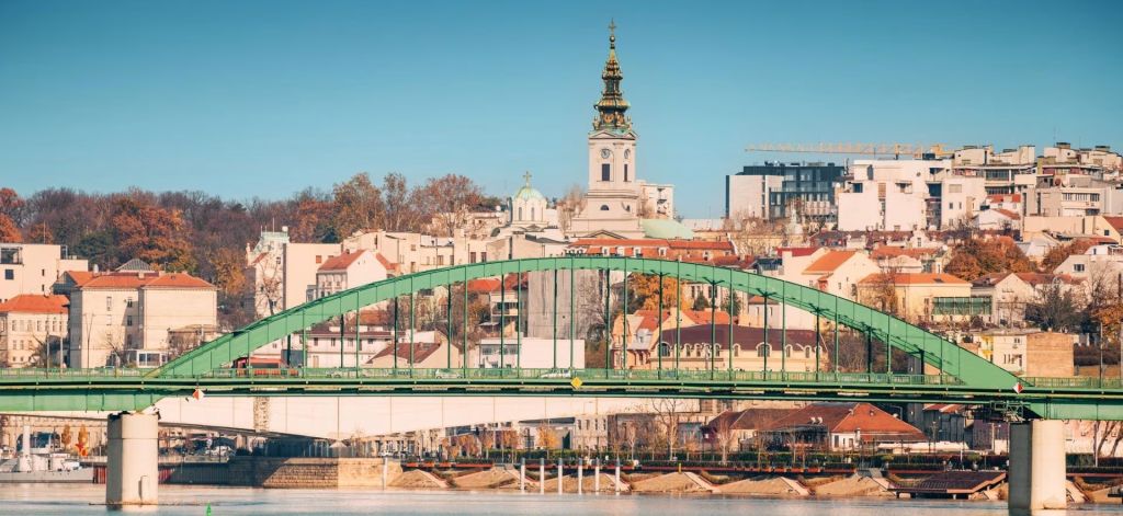 Serene waters of the Sava river frame Belgrade's skyline, blending ...