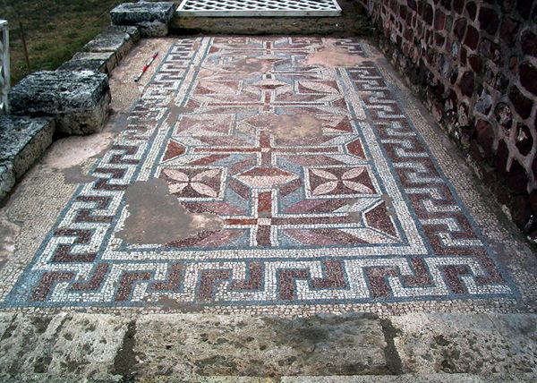Geometric Roman floor mosaic with red, white, and blue patterns at Mediana in Niš